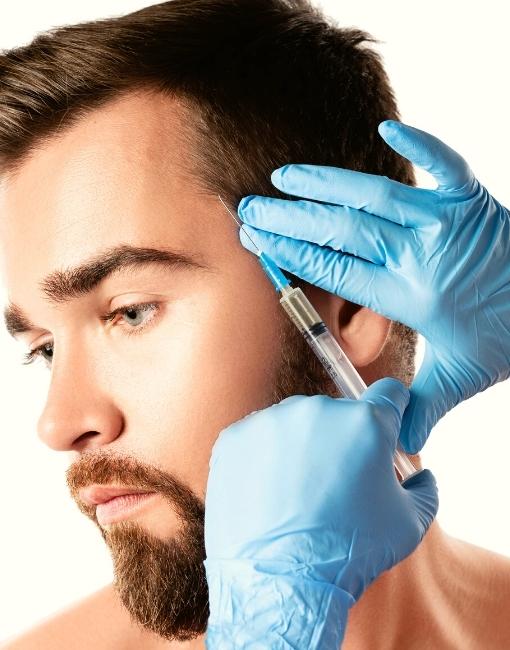 Man receiving PRP hair treatment for hair loss